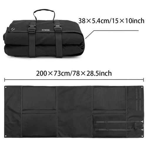 Portable tactical shooting mat, black roll-up with handle; shown folded and flat